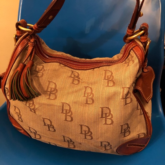 Dooney & Bourke Tote Purse Brown/Tan with tassels. - Picture 1 of 7